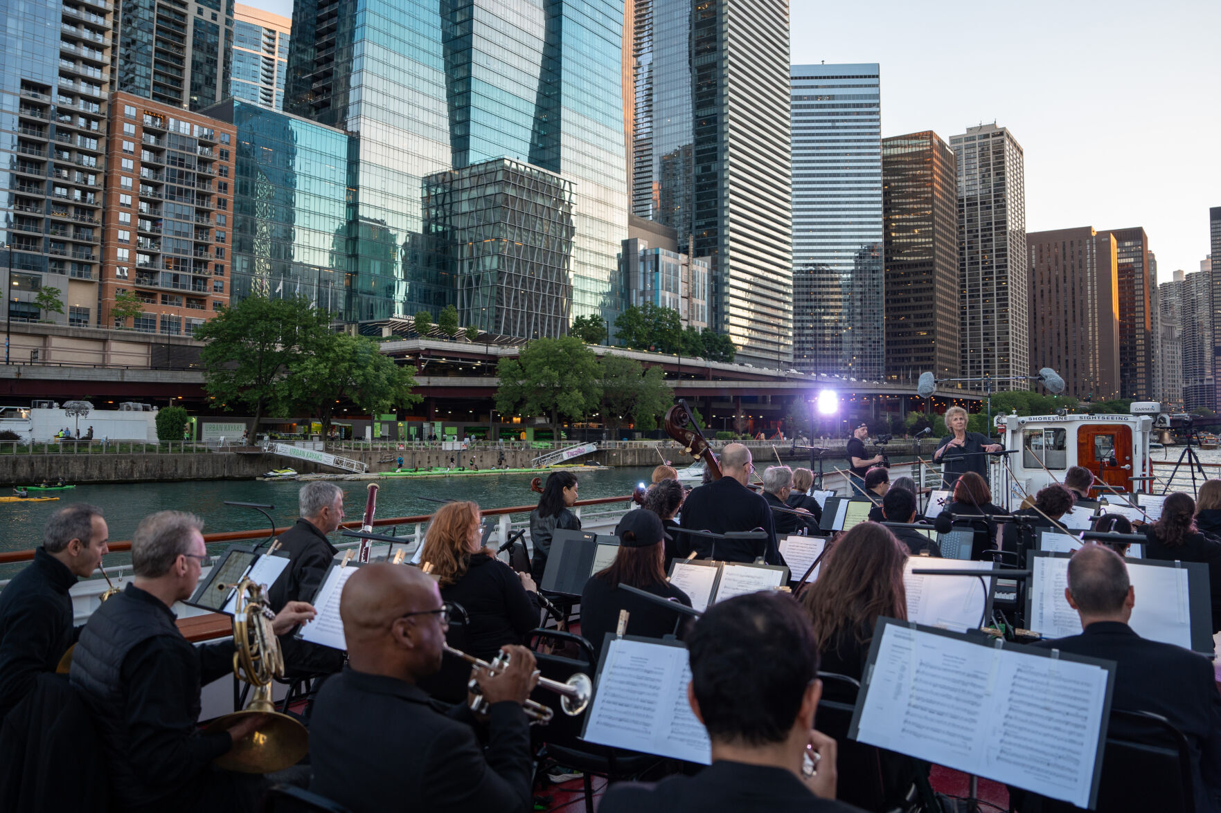 Trial run for Music of the Baroque's upcoming historic The Chicago Water Music performance conducted by Dame Jane Glover on the Chicago River. (Photo courtesy of Music of the Baroque by Elliot Mandel)
